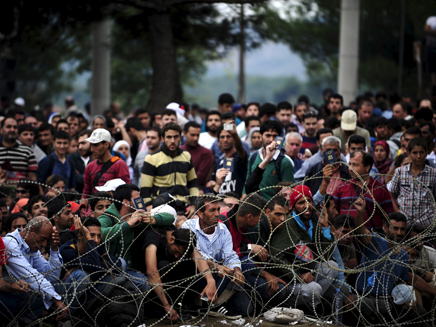 יוחזרו לטורקיה? פליטים בגבול יוון (צילום: רויטרס)