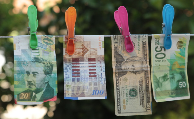 שטרות כסף תלויים לייבוש (אילוסטרציה: Shutterstock)