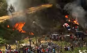 נהג מירוצים גרם לשריפה ביער (צילום: יוטיוב\FIA World Rally Championship)