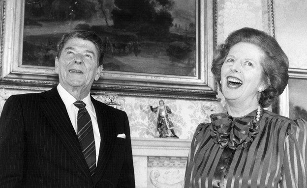ראש הממשלה מרגרט תאצ'ר והנשיא רונלד רייגן צוחקים (צילום: Keystone, GettyImages IL)