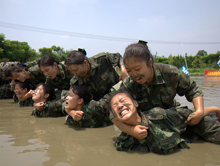 אימון נשים בסין (צילום: VCG, GettyImages IL)