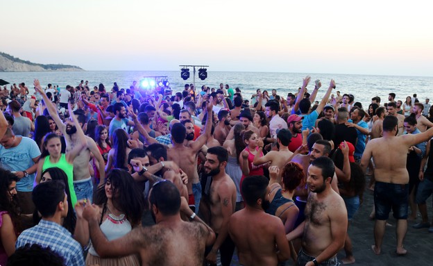 מסיבת חוף בסוריה (צילום: אימג'בנק/AFP)