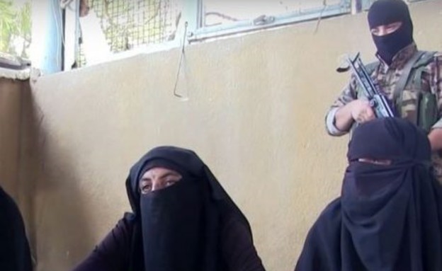 דאעש בבגדי נשים (צילום: twitter)