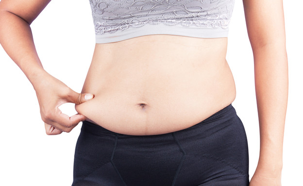 בטן של אישה (צילום: Pikul Noorod, Shutterstock)