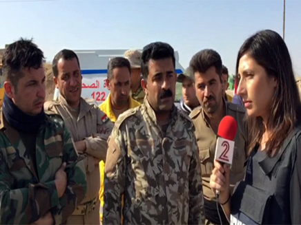 עם הלוחמים הכורדים בחזית (צילום: חדשות 2)