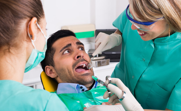 רופא שיניים (צילום: Shutterstock)