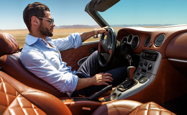 גבר נוהג במכונית יוקרה (אילוסטרציה: Shutterstock)