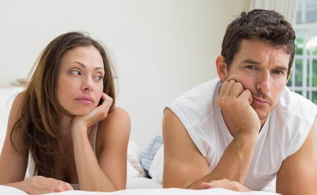 גבר ואישה במיטה (צילום: Shutterstock)