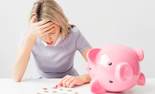 אישה בבעיות כלכליות (אילוסטרציה: Shutterstock)