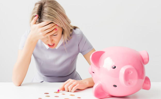 אישה בבעיות כלכליות (אילוסטרציה: Shutterstock)