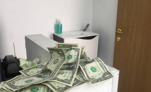 כסף שהשאירו תיירים במספרה בבית שאן (צילום: אלבום פרטי, פייסבוק. צילום: שימוש לפי סעיף 27א' לחוק זכויות יוצרים)