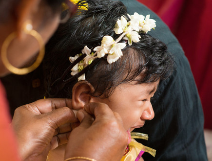 ילדה עם חורים באוזניים (צילום: Shutterstock)