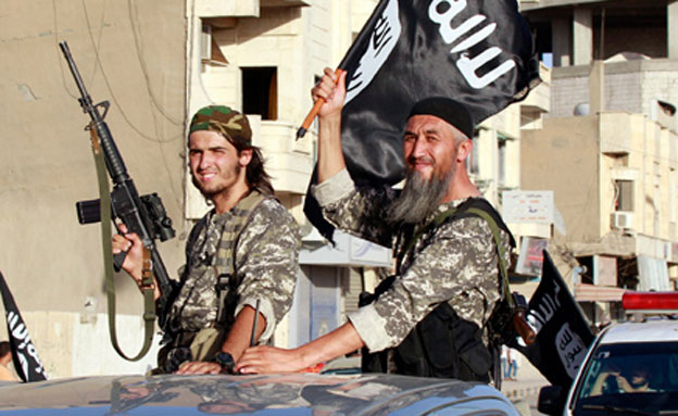 אנשי דאע"ש (ארכיון) (צילום: רויטרס)