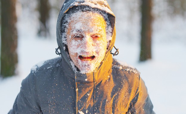 איש קפוא בשלג (צילום: sun ok, Shutterstock)