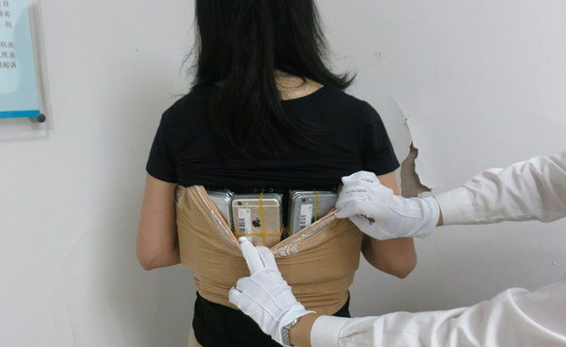 אישה שניסתה להבריח 102 אייפונים לסין (צילום:  יחסי ציבור )