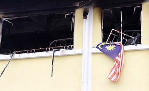 "ראינו את ידיהם מבעד לחלונות", מלזיה (צילום: רויטרס)