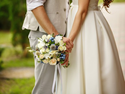 זוג בחתונה (צילום: By Dafna A.meron, shutterstock)