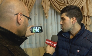 הפלסטיני שהוכה בריאיון לחדשות 2 (צילום: החדשות)
