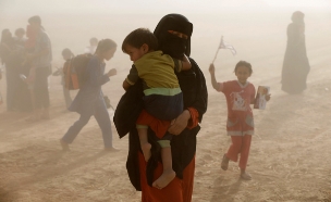 החיים במוסול תחת דאעש (צילום: רויטרס)