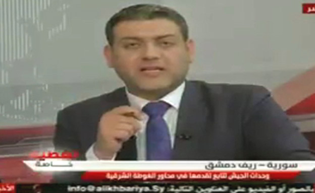 מגיש בטלוויזיה בסוריה (צילום: חדשות 2)