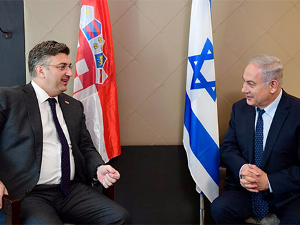 נתניהו וראש ממשלת קרואטיה בדאבוס (צילום: עמוס בן גרשום/ לע''מ)