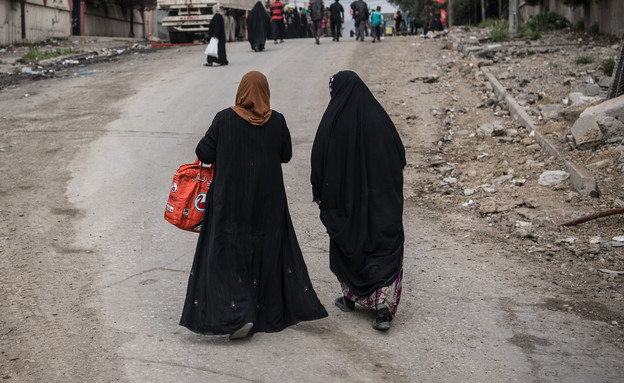 נשים במוסול (צילום: Carl Court, gettyimages)