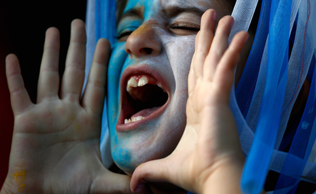 אוהד ארגנטינה צעיר (צילום:  Laurence Griffiths/Getty Images)