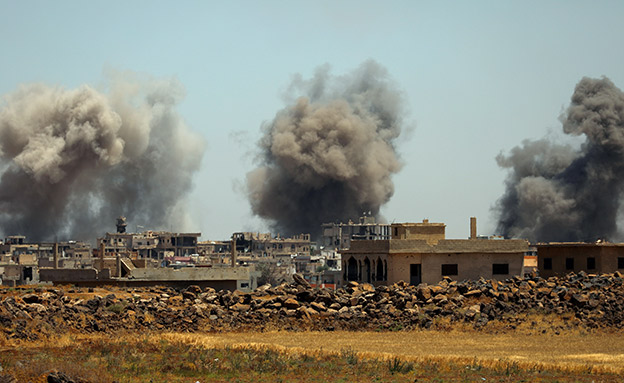 תקיפות של צבא אסד בדרעא (צילום: רויטרס, חדשות)
