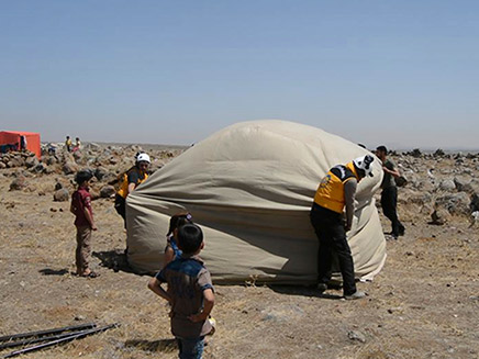 פליטים מהקרבות באזור דרעא (צילום: AP, חדשות)