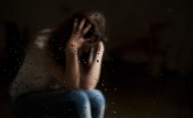 אישה עצובה אילוסטרציה (צילום: Shutterstock)