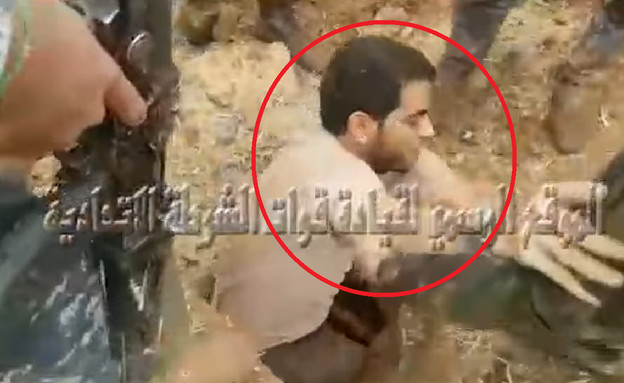 מחבל דאע"ש קבר את עצמו בחיים - ונתפס (צילום: צילום מסך פייסבוק  الموقع الرسمي لقيادة قوات الشرطة الاتحادية)