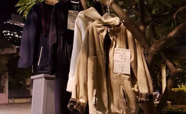מעילים ברחוב (צילום: צחי אבינועם ועמית לינד)