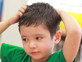 ילד מגרד בראש (אילוסטרציה: By Dafna A.meron, shutterstock)