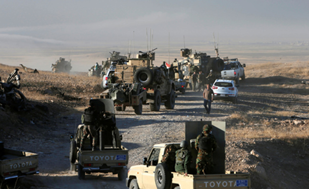 כוחות נערכים בדרך למוסול (צילום: רויטרס, חדשות)