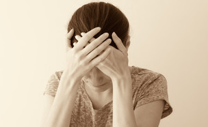 אישה עצובה (צילום: Shutterstock)