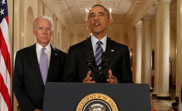 אובמה וסגנו ביידן מכריזים על ההסכם ב-201 (צילום: רויטרס, חדשות)