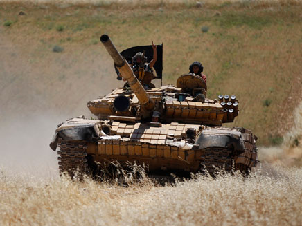 כוחות ג'בהת א-נוסרה בסוריה (צילום: רויטרס, חדשות)