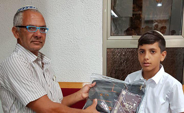 יגאל סעדון ז"ל עם בנו (צילום: חדשות)