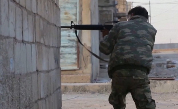 הלחימה בין הטורקים לכורדים בסוריה (צילום: רויטרס_)