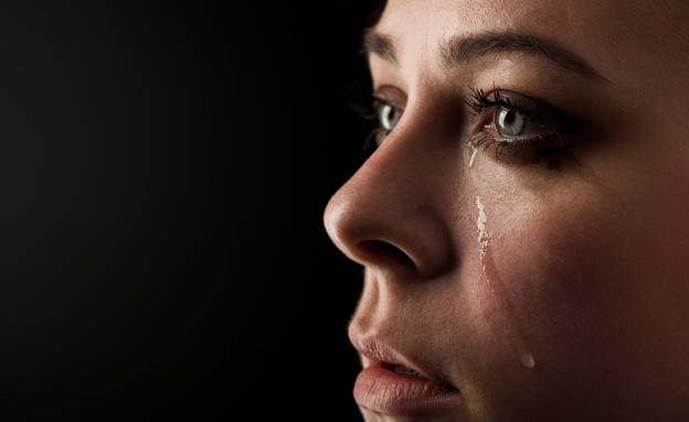 אישה בוכה (צילום: SHUTTERSTOCK)