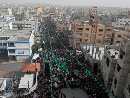   תהלוכה לציון 32 שנים להקמת החמאס בעזה (צילום: רויטרס, רויטרס_)