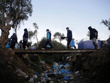 פליטים באי לסבוס (צילום: רויטרס_)