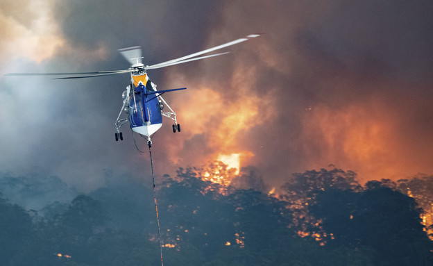 גל שרפות ענק מכה באוסטרליה‎ (צילום: AP)