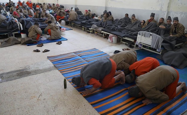 אסירי דאעש שמוחזקים בסוריה (צילום: Goran Tomasevic, רויטרס_)