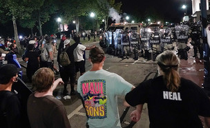 מהומות בקנושה, ארה"ב (צילום: AP)