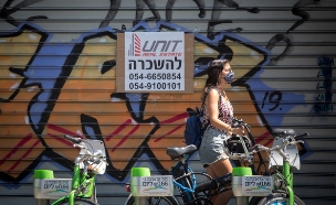 שלט להשכרה על חנות שנסגרה בתל אביב (צילום: מרים אלסטר, פלאש/90 )