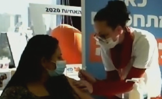 בשידור חי: חיסון לאישה בהריון מתקדם (צילום: מתוך "ישראל עכשיו", קשת12)