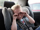 ילד בוכה במכונית (צילום: shutterstock By Maria Symchych)