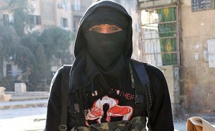 פעילת ארגון הטרור הקיצוני (צילום: BARAA AL-HALABI/AFP, GettyImages)