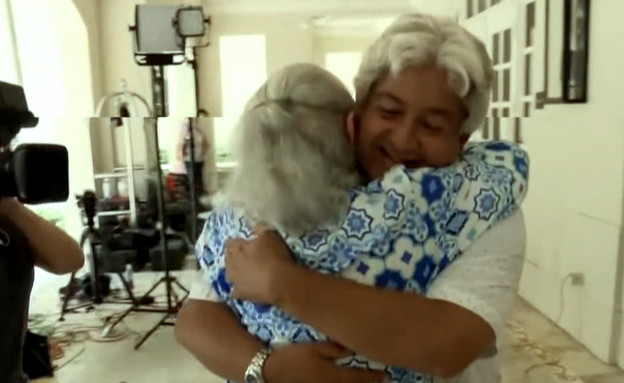 האסון במיאמי: מפגש בין דיירת ששרדה לשכן שהציל אותה (צילום: cnn)